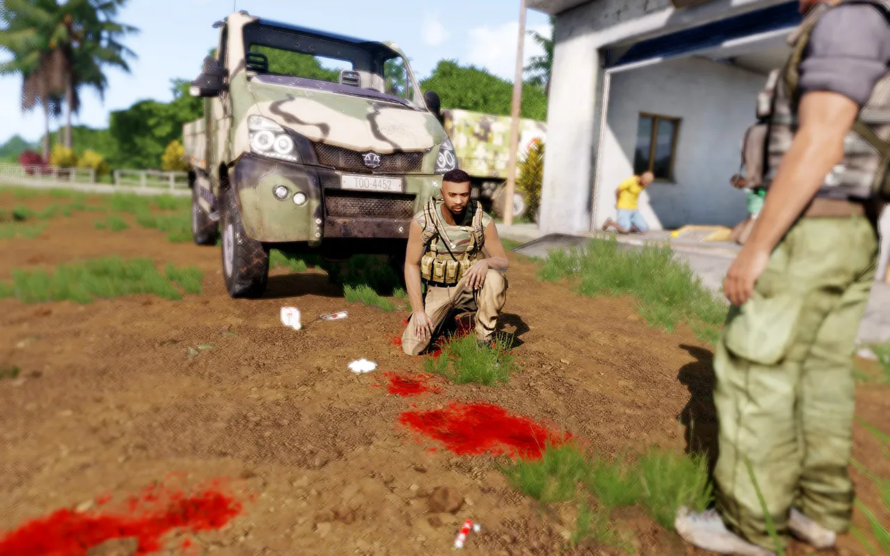 A wounded insurgent in front of a damaged truck.